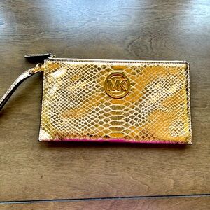 Gold Michael Kors wristlet